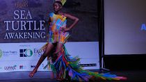 Plastic bottles and food wrappers hit the runway in Lagos “trashion” show