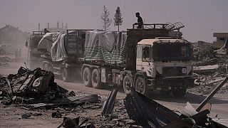 Humanitarian Aid trucks roll into Gaza amid fragile ceasefire