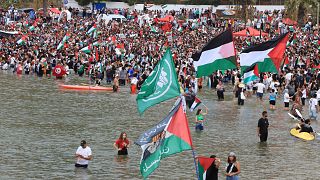 Gaza aid flotilla delays departure from Tunisian port after drone attacks