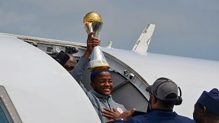 Nigeria’s women’s football team receives hero’s welcome after winning continental title