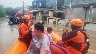 Flash floods and landslides leave dozens dead or missing in Indonesia