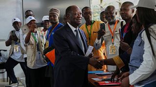 Ivory Coast: supporters of re-elected president Alassane Ouattara celebrate