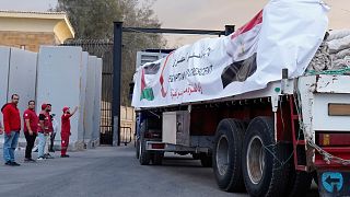 Aid trucks enter Gaza as Israel moves to reopen Rafah crossing